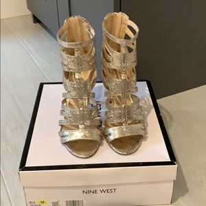 Gold snake skin print zipper back Nine West heels